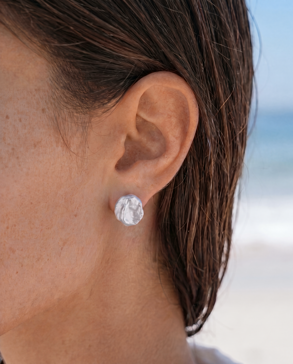 Pelara Stud Earrings worn by model