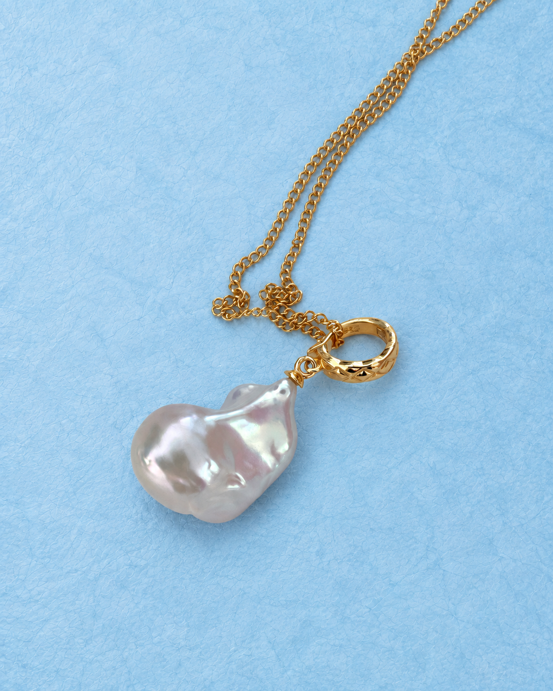 YEL-610 pendant detail on light blue background