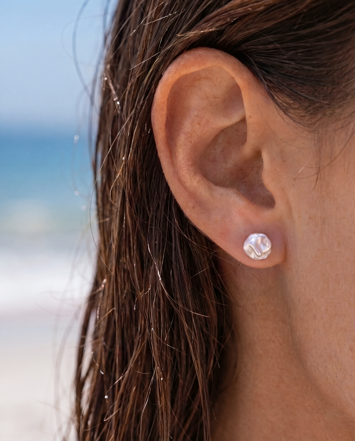 Tessira Earrings worn by model