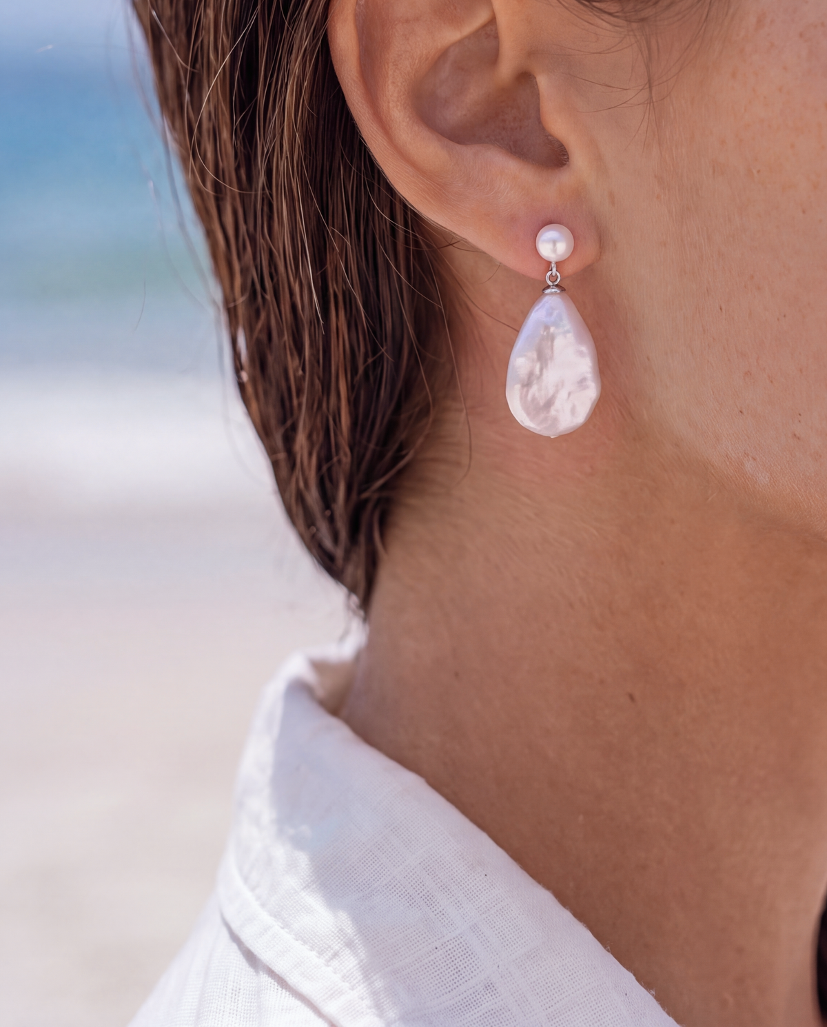 Pluvane Earrings worn by model