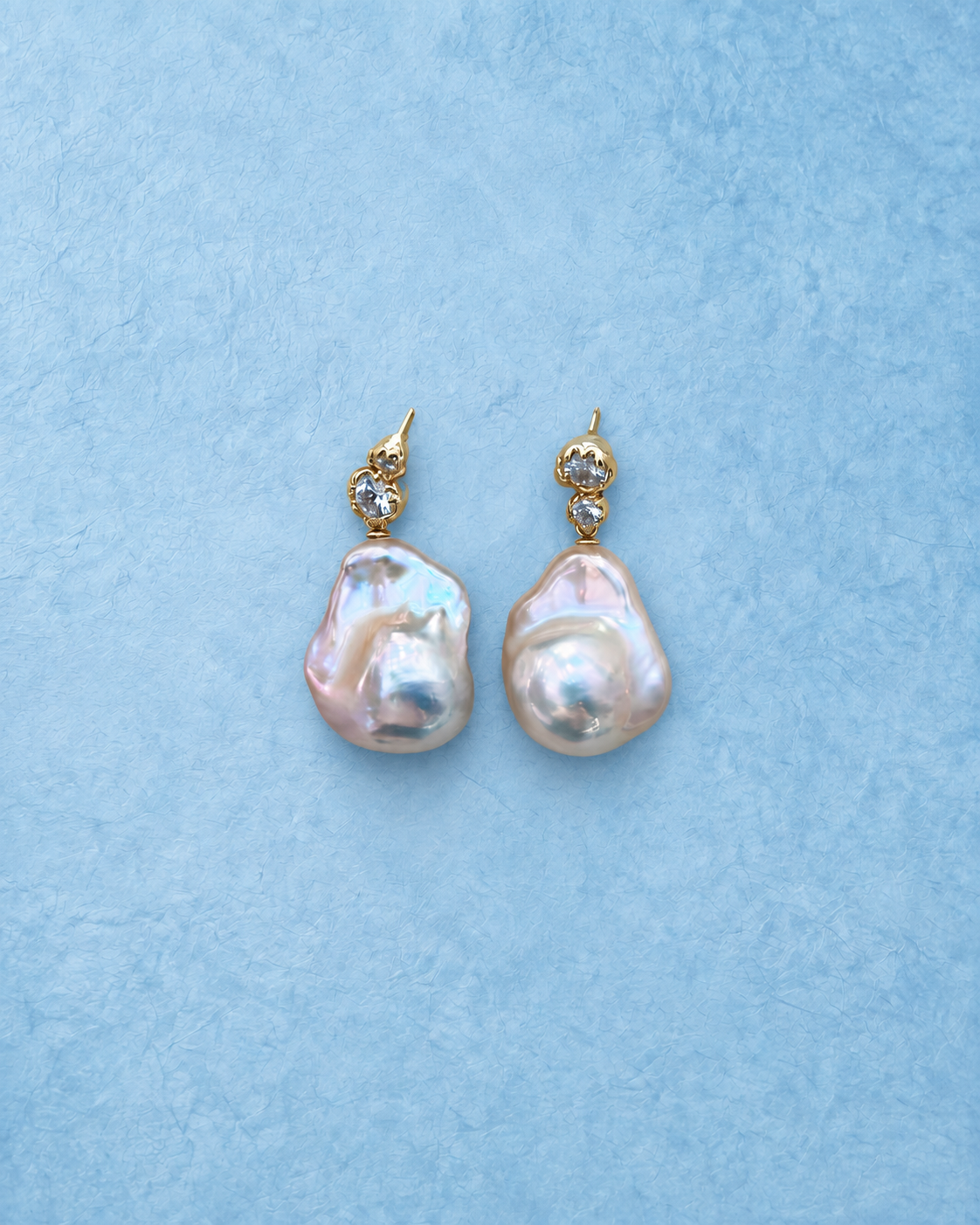 YEL-826 earrings on light blue background