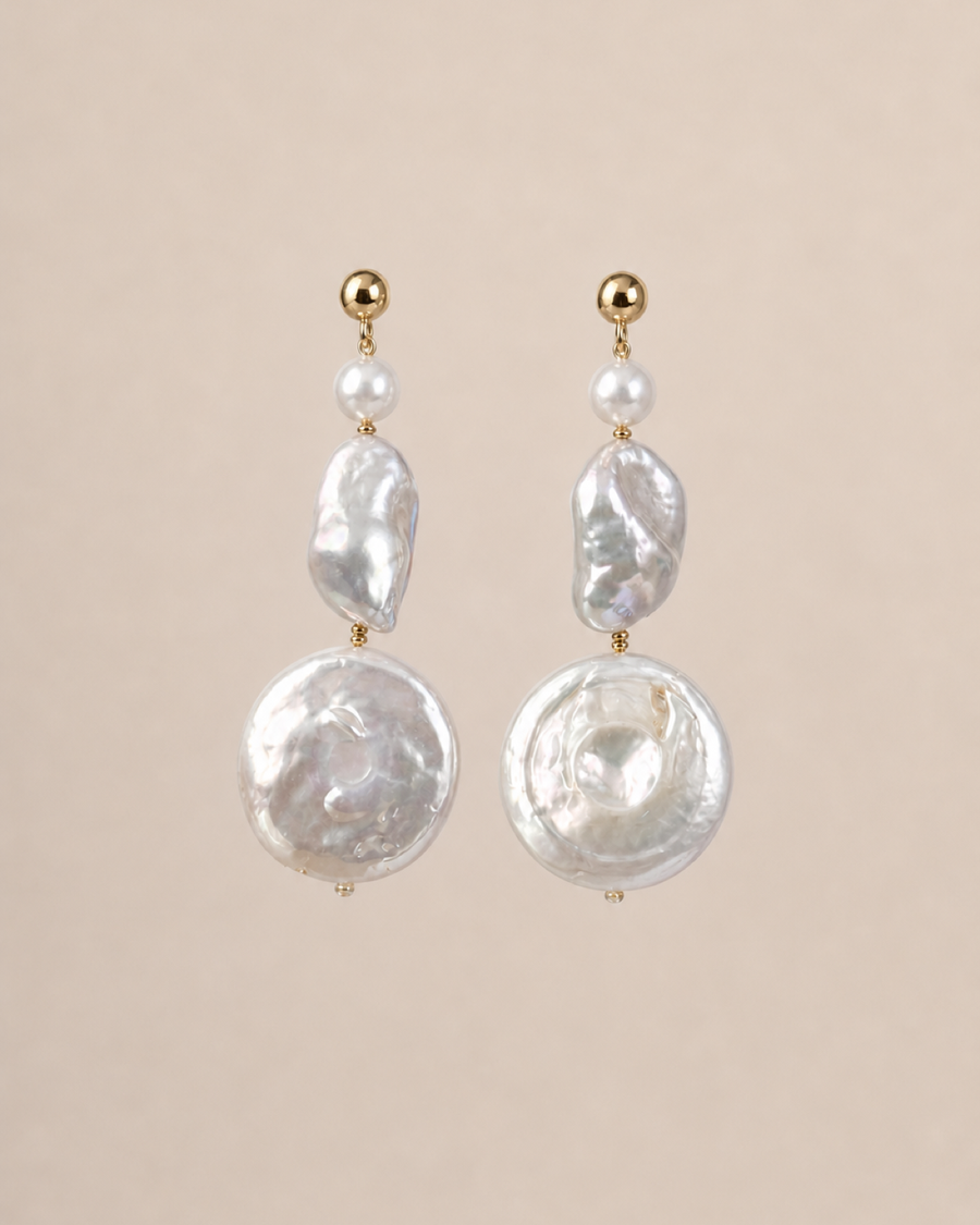 Luna Coin Pearl Drops on a warm neutral background