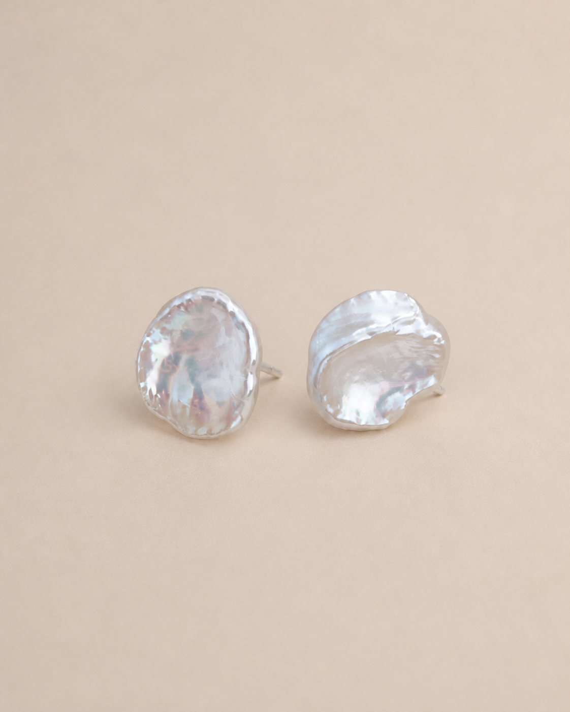 Petal Pearl Studs on a warm greige background