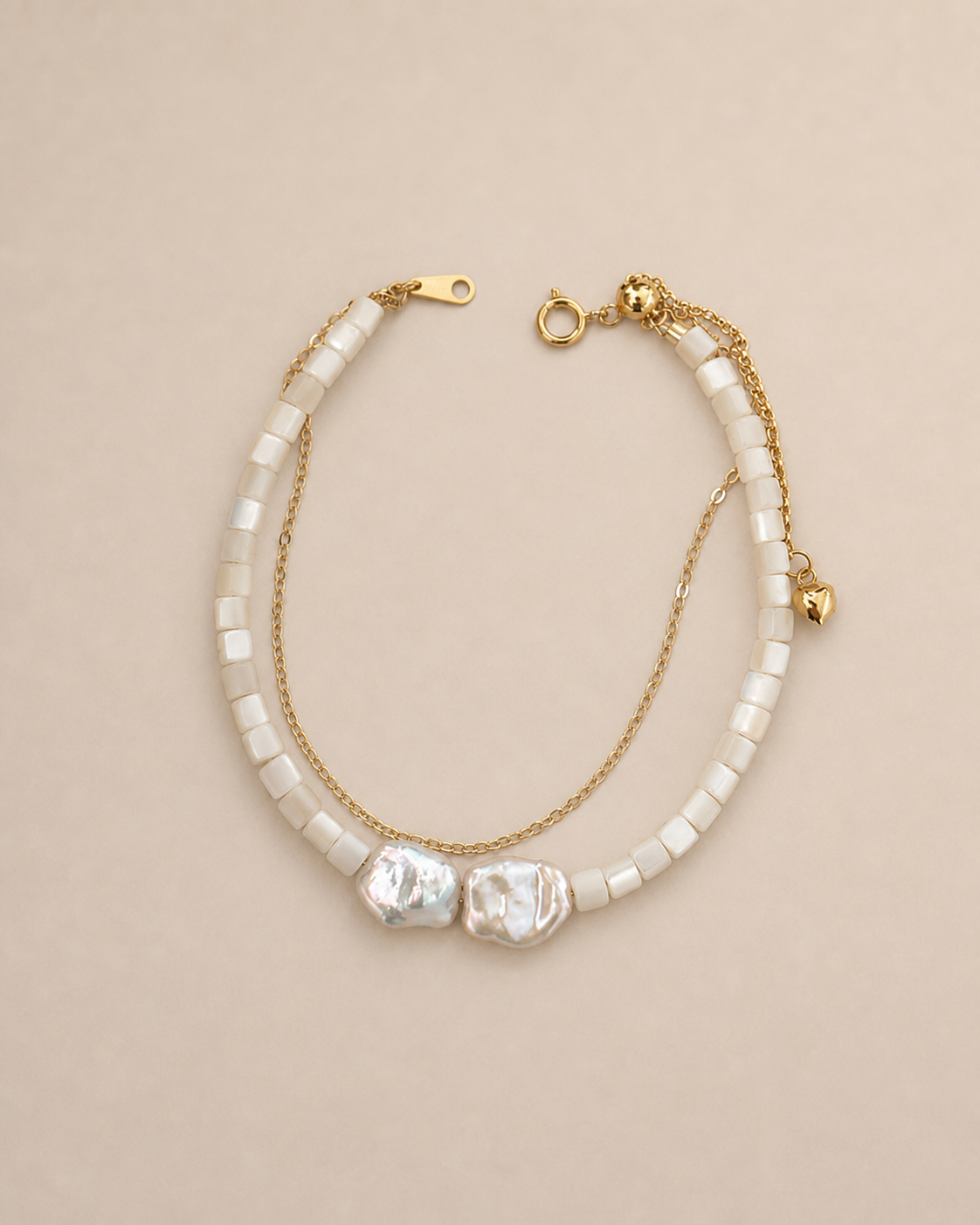 Tide Double-Strand Pearl Bracelet on a warm greige background